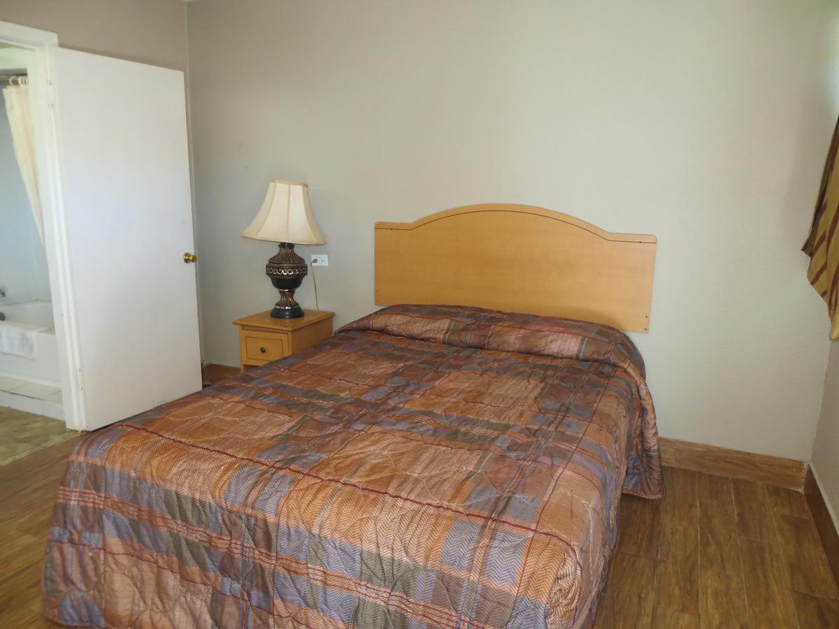 Paradise Inn Bay City Bagian luar foto