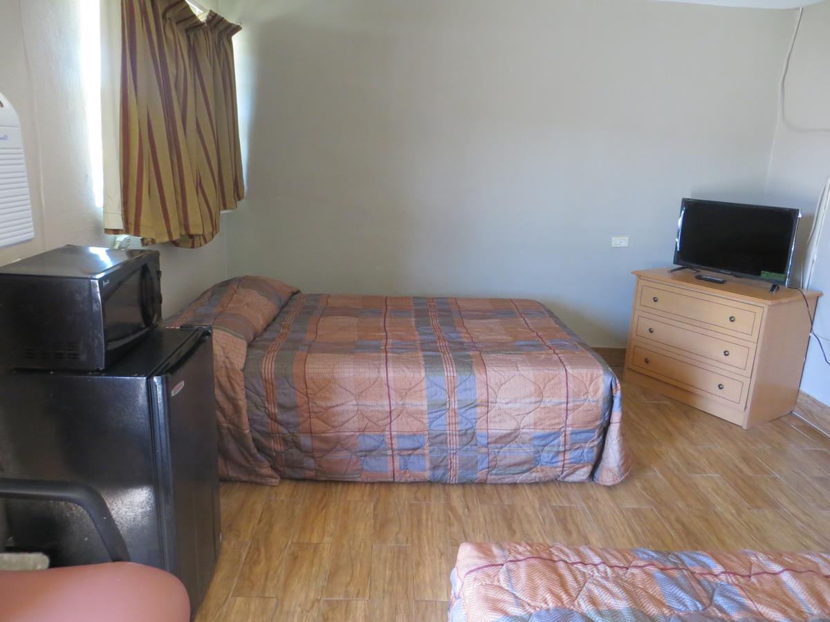 Paradise Inn Bay City Bagian luar foto