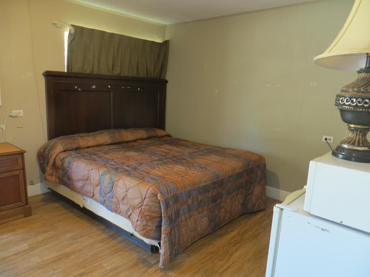 Paradise Inn Bay City Bagian luar foto